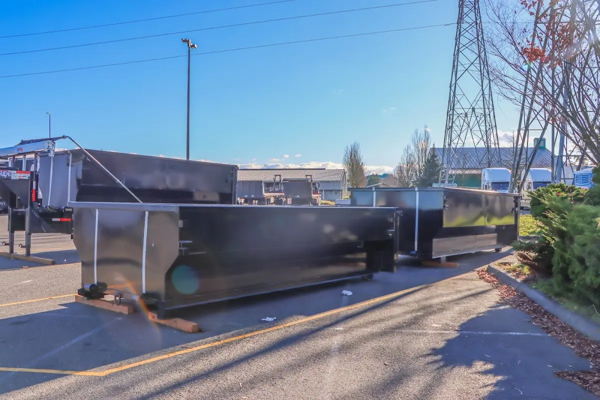 Roll-off dumpster ready for waste disposal at job site for 2 Yard Dumpster Rental in Crystal Lake